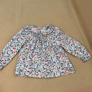 Liberty print toddler girl blouse with Peter Pan neckline and smock detailing